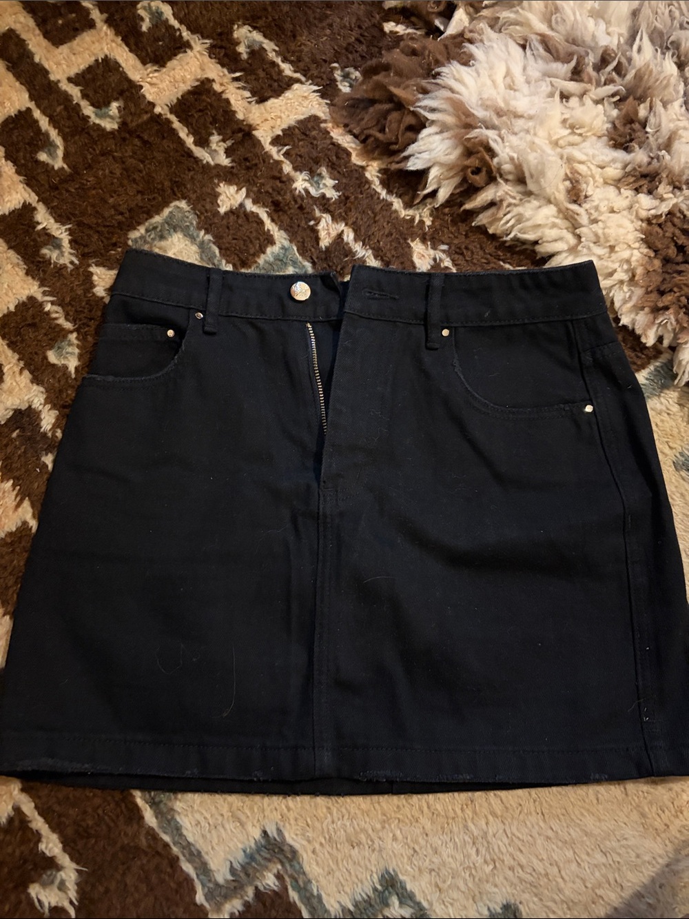 Black Mini Skirt with Front Zip and Pocket Details